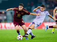 Ander Herrera of Athletic Club and Niccolo' Pisilli of AS Roma compete for the ball during the UEFA Europa League 2024/25 League Phase MD1 m...