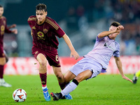 Ander Herrera of Athletic Club and Niccolo' Pisilli of AS Roma compete for the ball during the UEFA Europa League 2024/25 League Phase MD1 m...