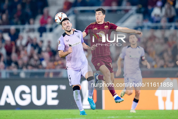 Aitor Paredes of Athletic Club and Eldor Shomurodov of AS Roma jump for the ball during the UEFA Europa League 2024/25 League Phase MD1 matc...