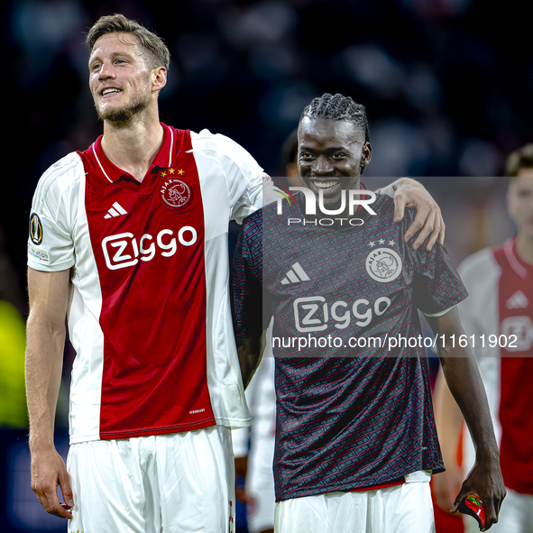 AFC Ajax Amsterdam forward Wout Weghorst and AFC Ajax Amsterdam forward Bertrand Traore during the match Ajax vs. Besiktas at the Johan Crui...