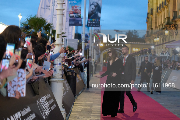 Monica Bellucci and Tim Burton attend the red carpet for Maria Callas during the 72nd San Sebastian International Film Festival in San Sebas...