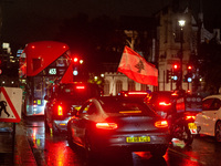 A Lebanese flag is placed on a car during a Lebanon Ceasefire Protest at 10 Downing Street in London, United Kingdom, on September 26, 2024....