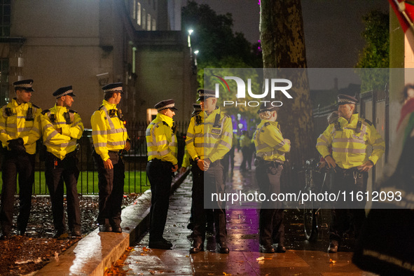 Metropolitan Police officers are on duty during the Lebanon Ceasefire Protest at 10 Downing Street in London, England, on September 26, 2024...