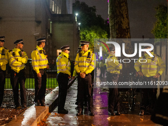 Metropolitan Police officers are on duty during the Lebanon Ceasefire Protest at 10 Downing Street in London, England, on September 26, 2024...