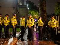 Metropolitan Police officers are on duty during the Lebanon Ceasefire Protest at 10 Downing Street in London, England, on September 26, 2024...