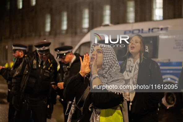 A pro-Lebanon and pro-Palestine protester at the Lebanon Ceasefire Protest at 10 Downing Street in London, United Kingdom, on September 26,...