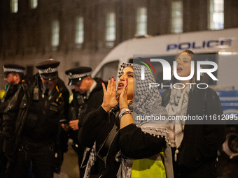 A pro-Lebanon and pro-Palestine protester at the Lebanon Ceasefire Protest at 10 Downing Street in London, United Kingdom, on September 26,...