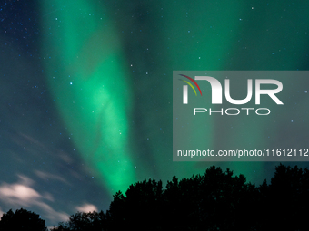 The Aurora Borealis, commonly known as the Northern Lights, are seen in the sky above Alta, Norway, on September 26, 2024. (