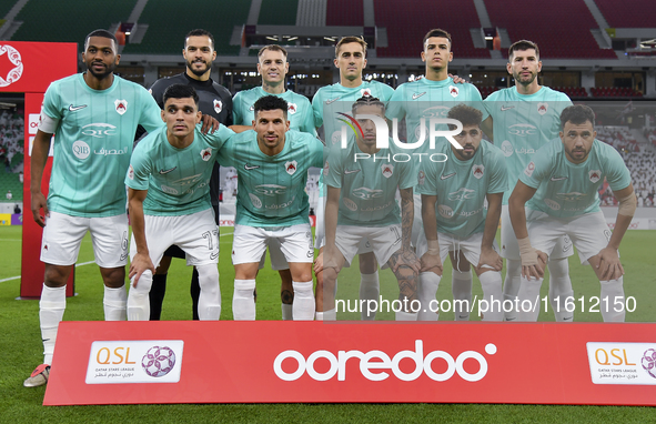 Al Rayyan SC players pose for a team photo prior to the Ooredoo Qatar Stars League 24/25 match between Al Rayyan SC and Al Arabi SC at Al Th...