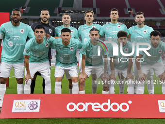 Al Rayyan SC players pose for a team photo prior to the Ooredoo Qatar Stars League 24/25 match between Al Rayyan SC and Al Arabi SC at Al Th...