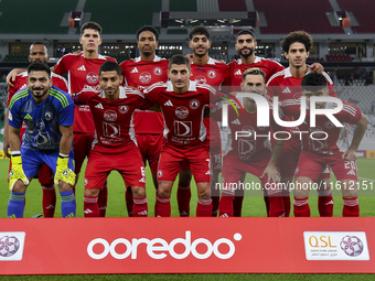 Al Arabi SC players pose for a team photo prior to the Ooredoo Qatar Stars League 24/25 match between Al Rayyan SC and Al Arabi SC at Al Thu...