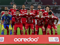 Al Arabi SC players pose for a team photo prior to the Ooredoo Qatar Stars League 24/25 match between Al Rayyan SC and Al Arabi SC at Al Thu...