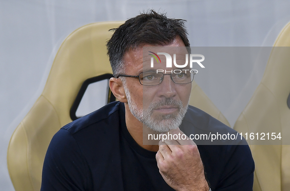 Anthony Patrick Hudson, head coach of Al Arabi SC, looks on before the Ooredoo Qatar Stars League 24/25 match between Al Rayyan SC and Al Ar...