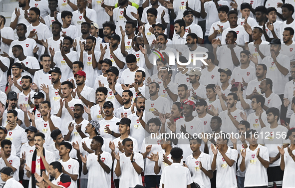 Fans of Al Rayyan SC cheer for the team during the Ooredoo Qatar Stars League 24/25 match between Al Rayyan SC and Al Arabi SC at Al Thumama...