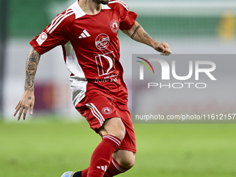 Rodriguez Sanchez Rodrigo of Al Arabi SC plays in the Ooredoo Qatar Stars League 24/25 match between Al Rayyan SC and Al Arabi SC at Al Thum...