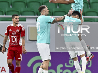 Achraf Bencharki (C) of Al Rayyan SC celebrates after scoring a goal during the Ooredoo Qatar Stars League 24/25 match between Al Rayyan SC...