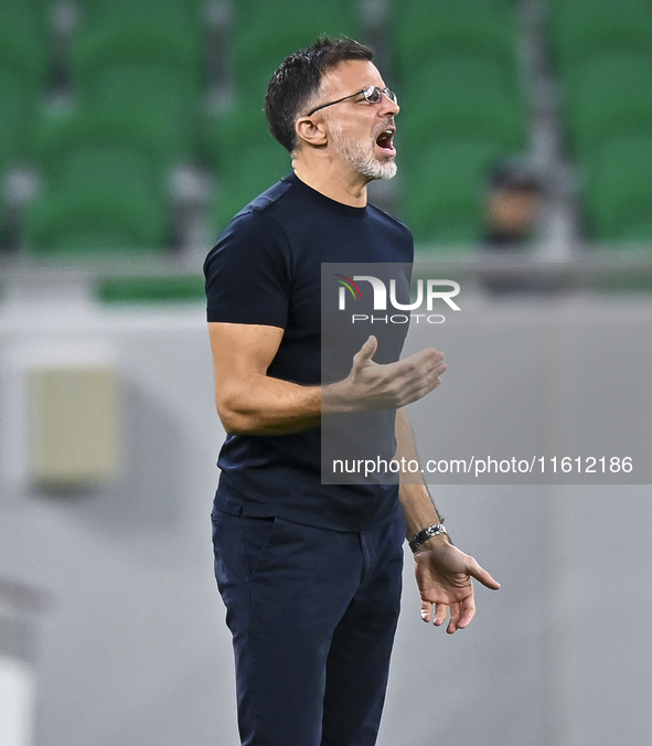 Anthony Patrick Hudson, head coach of Al Arabi SC, reacts during the Ooredoo Qatar Stars League 24/25 match between Al Rayyan SC and Al Arab...