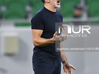 Anthony Patrick Hudson, head coach of Al Arabi SC, reacts during the Ooredoo Qatar Stars League 24/25 match between Al Rayyan SC and Al Arab...