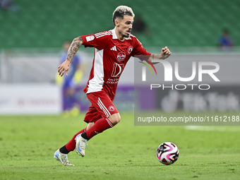 Rodriguez Sanchez Rodrigo of Al Arabi SC plays in the Ooredoo Qatar Stars League 24/25 match between Al Rayyan SC and Al Arabi SC at Al Thum...