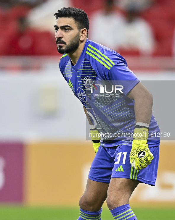 Jassim Adel Al-hail of Al Arabi SC is in action during the Ooredoo Qatar Stars League 24/25 match between Al Rayyan SC and Al Arabi SC at Al...