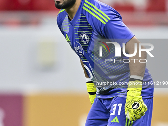 Jassim Adel Al-hail of Al Arabi SC is in action during the Ooredoo Qatar Stars League 24/25 match between Al Rayyan SC and Al Arabi SC at Al...