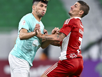 Murad Naji Hussein (L) of Al Rayyan SC battles for the ball with Marco Verratti (R) of Al Arabi SC during the Ooredoo Qatar Stars League 24/...