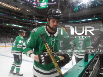 Jamie Benn #14 of the Dallas Stars prepares before the NHL preseason match between the Dallas Stars and the Minnesota Wild at American Airli...