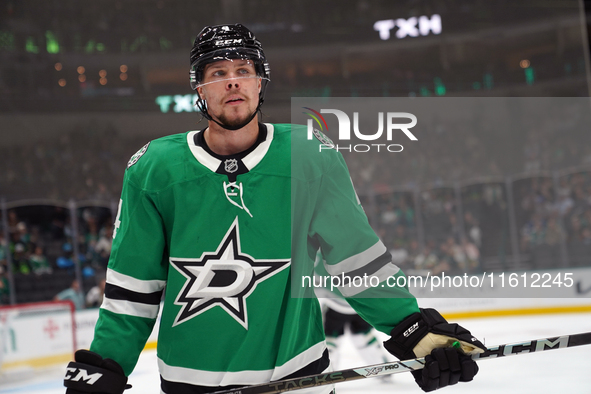 Miro Heiskanen #4 of the Dallas Stars reacts during the NHL preseason match between the Dallas Stars and the Minnesota Wild at American Airl...