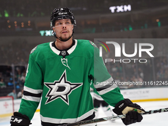 Miro Heiskanen #4 of the Dallas Stars reacts during the NHL preseason match between the Dallas Stars and the Minnesota Wild at American Airl...