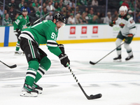 Tyler Seguin #81 of the Dallas Stars skates up the ice while controlling the puck during the NHL preseason match between the Dallas Stars an...