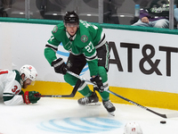 Mason Marchment #27 of the Dallas Stars skates up the ice while controlling the puck during the NHL preseason match between the Dallas Stars...