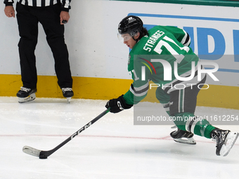 Antonio Stranges #71 of the Dallas Stars skates up the ice while controlling the puck during the NHL preseason match between the Dallas Star...