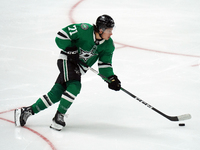 Antonio Stranges #71 of the Dallas Stars skates up the ice while controlling the puck during the NHL preseason match between the Dallas Star...