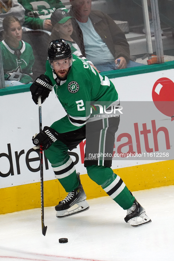 Brendan Smith #2 of the Dallas Stars skates up the ice while controlling the puck during the NHL preseason match between the Dallas Stars an...