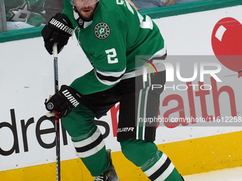 Brendan Smith #2 of the Dallas Stars skates up the ice while controlling the puck during the NHL preseason match between the Dallas Stars an...