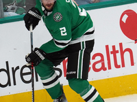 Brendan Smith #2 of the Dallas Stars skates up the ice while controlling the puck during the NHL preseason match between the Dallas Stars an...