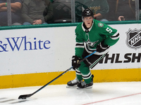 Nils Lundkvist #5 of the Dallas Stars skates up the ice while controlling the puck during the NHL preseason match between the Dallas Stars a...