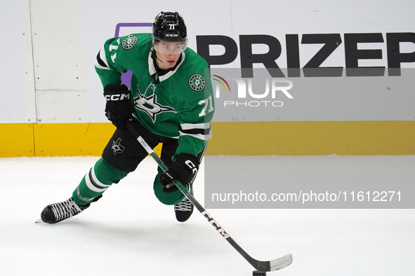 Antonio Stranges #71 of the Dallas Stars skates up the ice while controlling the puck during the NHL preseason match between the Dallas Star...