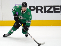 Antonio Stranges #71 of the Dallas Stars skates up the ice while controlling the puck during the NHL preseason match between the Dallas Star...