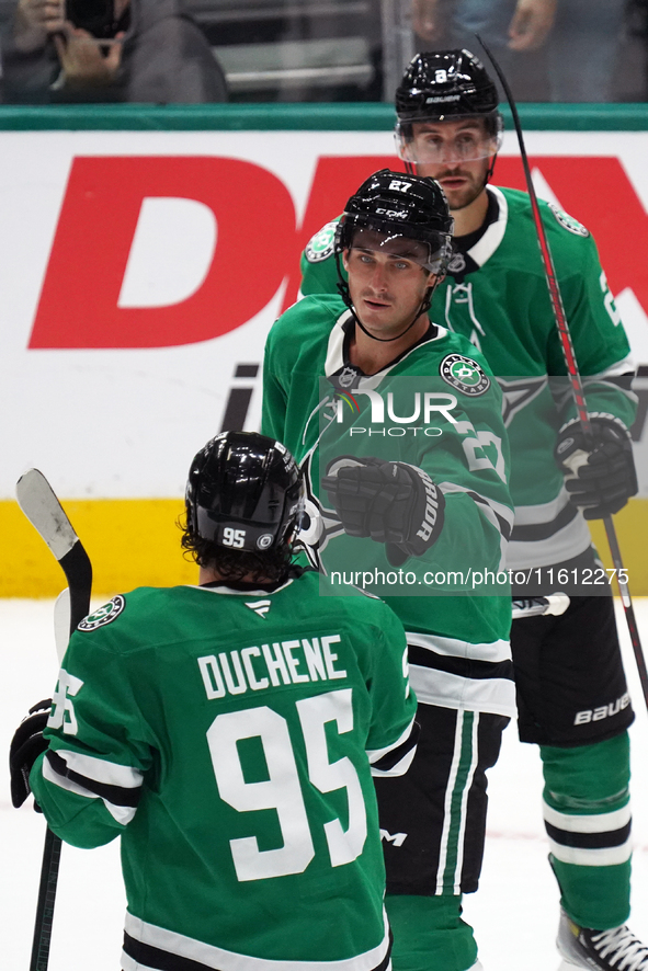 Mason Marchment #27 of the Dallas Stars is congratulated by Matt Duchene #95 after scoring a goal during the NHL preseason match between the...