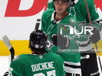 Mason Marchment #27 of the Dallas Stars is congratulated by Matt Duchene #95 after scoring a goal during the NHL preseason match between the...