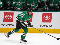 Tyler Seguin #91 of the Dallas Stars skates up the ice while controlling the puck during the NHL preseason match between the Dallas Stars an...