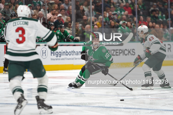 Oskar Back #10 of the Dallas Stars controls the puck during the NHL preseason match between the Dallas Stars and the Minnesota Wild at Ameri...