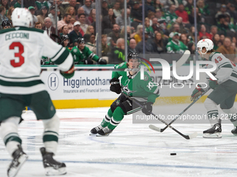 Oskar Back #10 of the Dallas Stars controls the puck during the NHL preseason match between the Dallas Stars and the Minnesota Wild at Ameri...