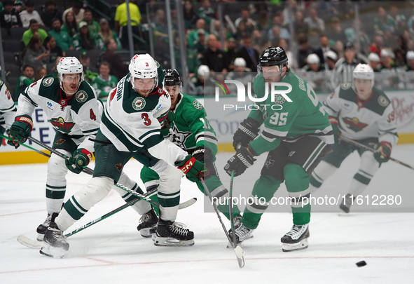 Matt Duchene #95 of the Dallas Stars blocks the puck shot by Joseph Cecconi #3 of the Minnesota Wild during the NHL preseason match between...