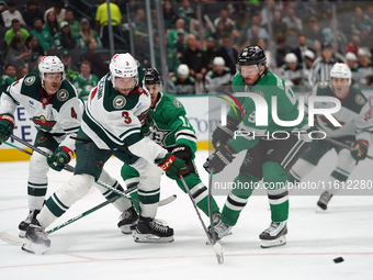 Matt Duchene #95 of the Dallas Stars blocks the puck shot by Joseph Cecconi #3 of the Minnesota Wild during the NHL preseason match between...