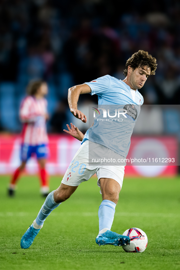 Marcos Alonso of RC Celta de Vigo controls the ball during the LaLIGA EA SPORTS match between RC Celta and Atletico de Madrid in Estadio Aba...