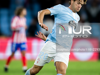 Marcos Alonso of RC Celta de Vigo controls the ball during the LaLIGA EA SPORTS match between RC Celta and Atletico de Madrid in Estadio Aba...