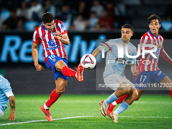 Julian Alvarez of Atletico de Madrid attempts a kick to score a goal during the LaLIGA EA SPORTS match between RC Celta and Atletico de Madr...