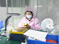 Workers at a liquid crystal display manufacturer work at Shanting Economic Development Zone in Zaozhuang, China, on September 25, 2024. (